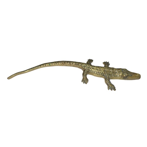 291 - Small brass crocodile stamped 19459 to base. Measures 25cm in length.