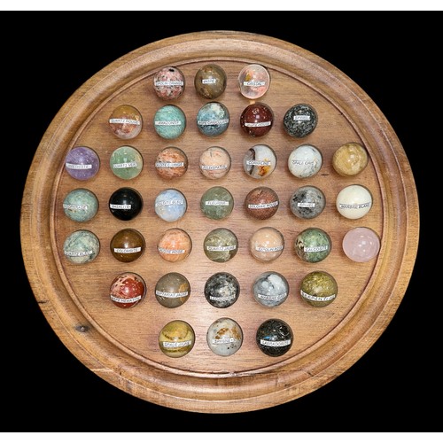 290 - Carved hardwood solitaire board with polished and labelled geological specimen marble balls. Board d... 