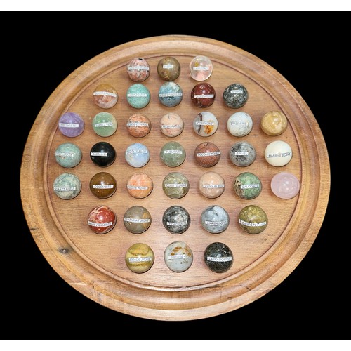 290 - Carved hardwood solitaire board with polished and labelled geological specimen marble balls. Board d... 