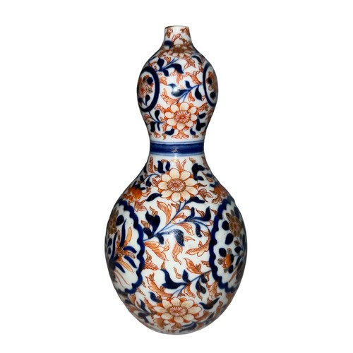 304 - Japanese Imari porcelain double gourd vase, marked in to base. Height 19.5cm.