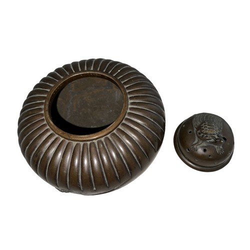 303 - Japanese bronze incense burner, round form decorated to two sides with a crashing wave, lid decorate... 