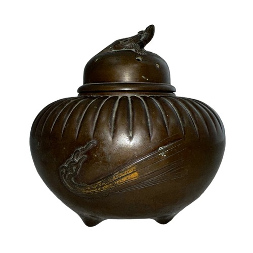 303 - Japanese bronze incense burner, round form decorated to two sides with a crashing wave, lid decorate... 