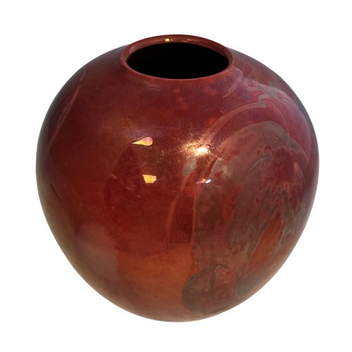 363 - A red Lustre ware hand painted vase, with hanging fruit decoration marked directly into the glaze. S... 