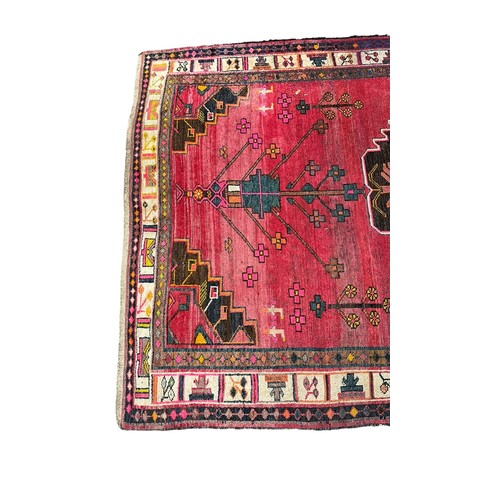 47 - Large Eastern (possibly Turkish) woven ground rug, stylised floral and geometric pattern with red ba... 