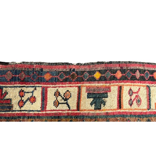 47 - Large Eastern (possibly Turkish) woven ground rug, stylised floral and geometric pattern with red ba... 