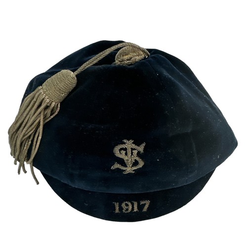 416 - A vintage blue velvet cricket cap, dated 1917. Embroidered with the letters S I and V.