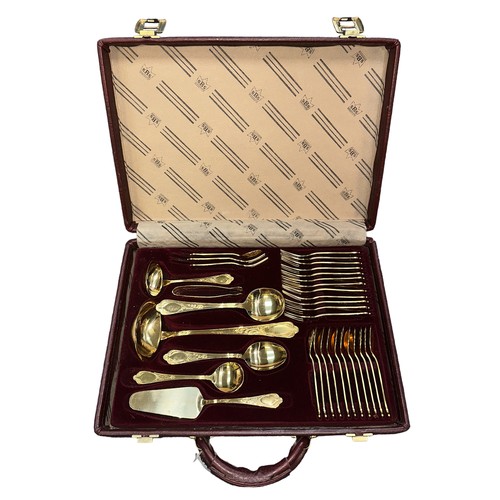 218 - BESTECKE SOLINGEN; a seventy-piece gold plated cutlery set in a leather-style briefcase, over two ti... 