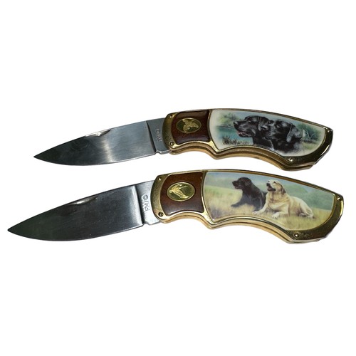 348 - Franklin Mint, a pair of Franklin Mint collectable knives with working dog scenes, pair of black Lab... 