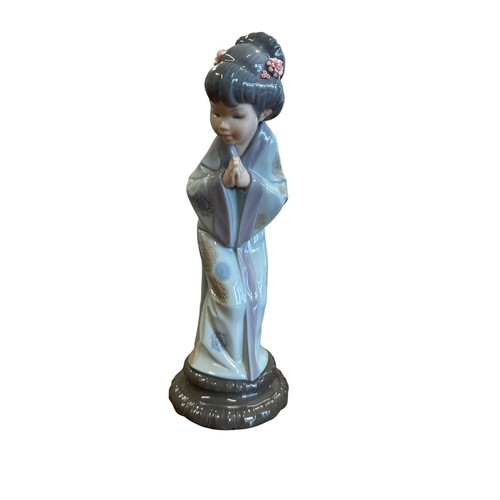 179 - Lladro. Japonesita Sayonara No. 4989 figurine, excellent in good box with packing pieces.