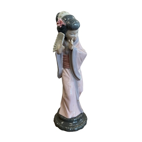 163 - Lladro. Japonesita Timida No. 4990 figurine, excellent in good box with packing pieces.