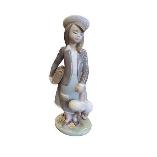 173 - Lladro. Otono Infatil (Autumn) No. 5218 figurine, excellent in good box with packing pieces.