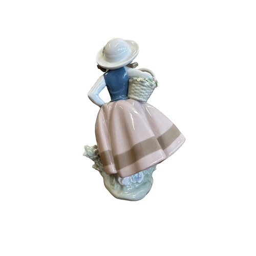 174 - Lladro. Linda con cesta (Sweet Scent) No. 5221 figurine, excellent in good box with packing pieces.