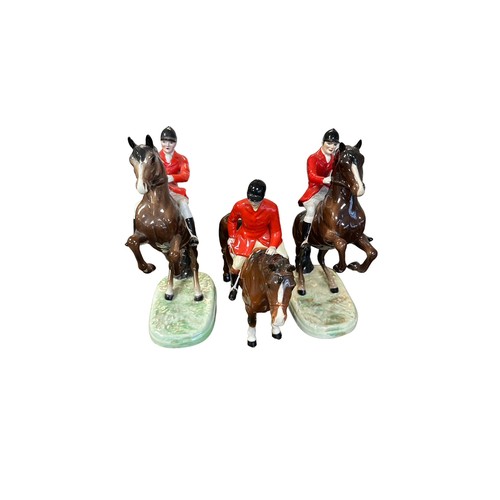 3 - Beswick, a eleven piece Beswick hunt scene comprising of; two reared rider figures on brown horses n... 