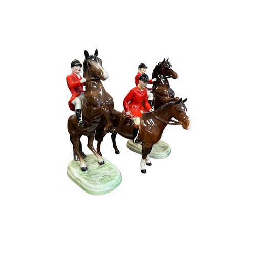 3 - Beswick, a eleven piece Beswick hunt scene comprising of; two reared rider figures on brown horses n... 