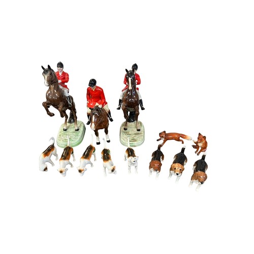 3 - Beswick, a eleven piece Beswick hunt scene comprising of; two reared rider figures on brown horses n... 