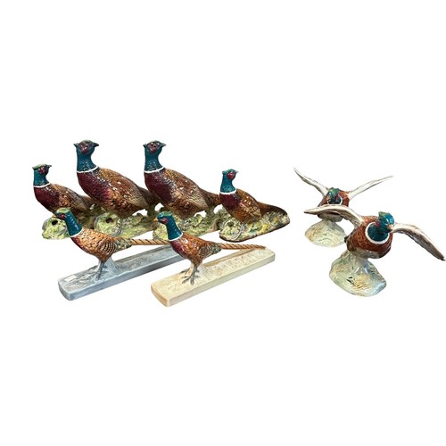 5 - Beswick, collection of eight ceramic Pheasant figures to include; Beswick Pheasant 1225 (x2), Beswic... 