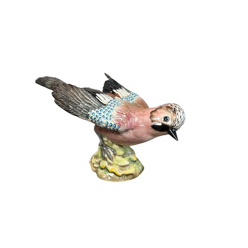 7 - Beswick, a Beswick Jay bird figure, model no. 1219. Height 14cm.