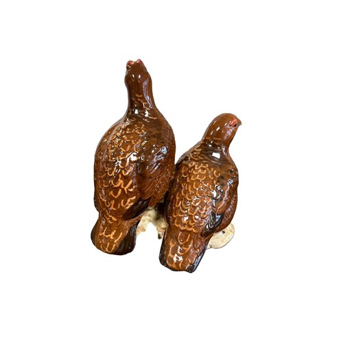 9 - Beswick, a Beswick pair of Grouse, model no. 2063. Height 15cm.