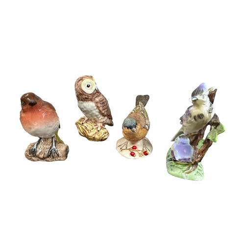 11 - Beswick small bird collection, to include; Grey Wagtail (1041), Chaffinch (991), Blue Tit (992), Sto... 