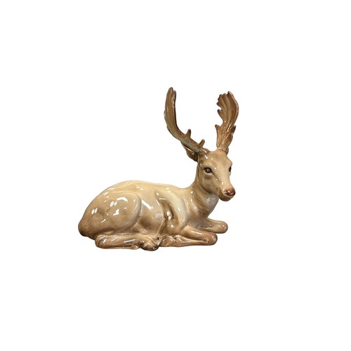 15 - Beswick, family of Deer to include; seated Stag model no. 954, Doe (x2) and Fawn (x2). Total quantit... 