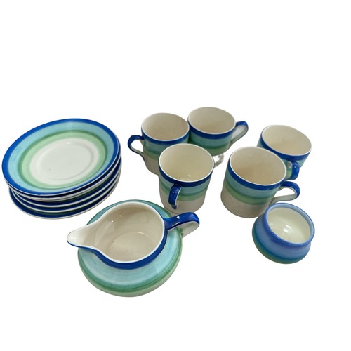 144 - A set of 1930s' Gray's pottery blue and green striped cups and saucers, (6 saucers, 5 cups), milk ju... 