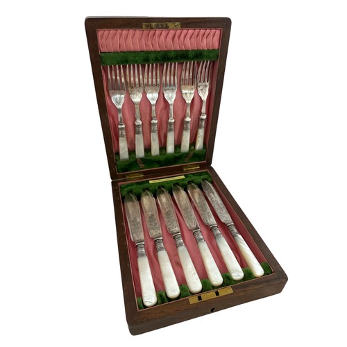 208 - A cased set of 6 fish knives and forks with silver collars and mother of pearl handles. Made by J.A.... 