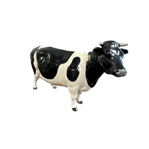 26 - Beswick, a Beswick Friesian Cow Family, including; Beswick Friesian Bull (CH Coddington Hilt Bar) 14... 