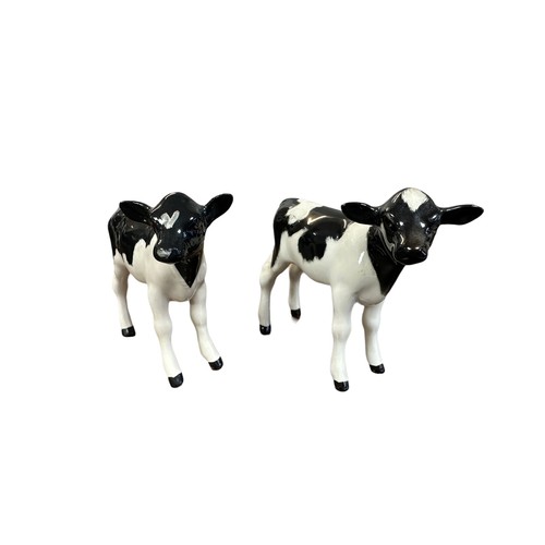 26 - Beswick, a Beswick Friesian Cow Family, including; Beswick Friesian Bull (CH Coddington Hilt Bar) 14... 