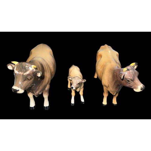 27 - Beswick, a Beswick Jersey Cow family, including; Beswick Jersey Cow Bull (CH. Dunsley Coy Boy) 1422,... 