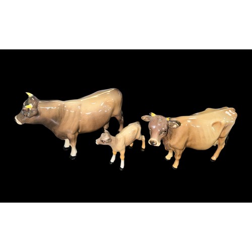 27 - Beswick, a Beswick Jersey Cow family, including; Beswick Jersey Cow Bull (CH. Dunsley Coy Boy) 1422,... 