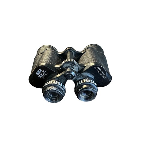 106 - Prinz binoculars Prinzlux 10x50 272 Ft at 1000 yds, with tan leather case (strap detached), generall... 