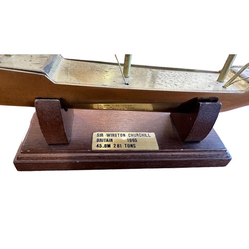 120 - Brass ship model - Sir Winston Churchill 1965. Length 27cm x height 21cm, on wooden stand.