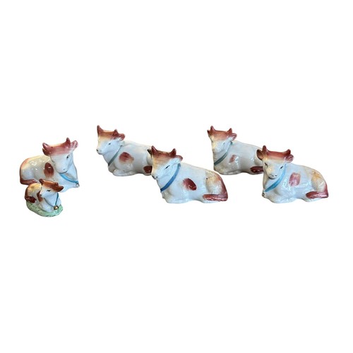 419 - Staffordshire, group of Staffordshire miniature calf figurines, five with similar design and one sma... 