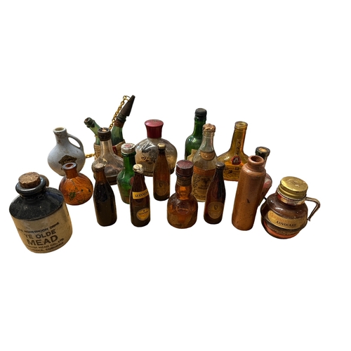 59 - Haig Dimple Whiskey plus 18 empty miniature bottles. 1 sealed Haig Dimple Whiskey, plus 18 opened mi... 