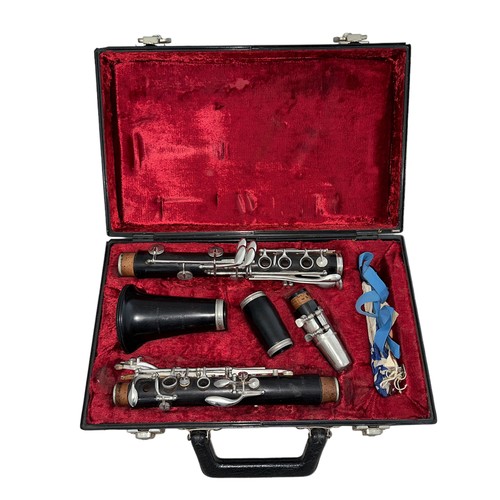 229 - A Boosey & Hawkes 'Regent' ebonised section clarinet in plush lined hard case.