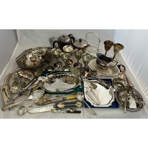 190 - A large number of mostly silver plated and some white metal items, including a silver plated Barker ... 