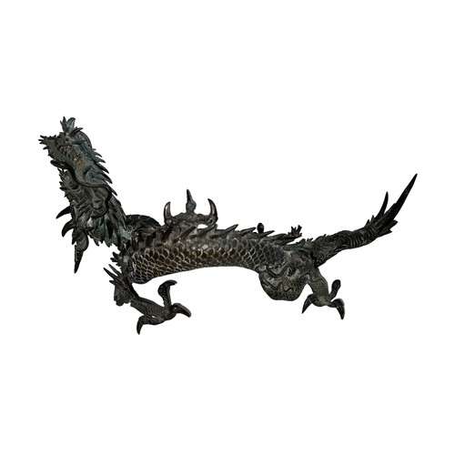 308 - Japanese large bronze model of a dragon, the creature resting on three legs with its head and arm ra... 