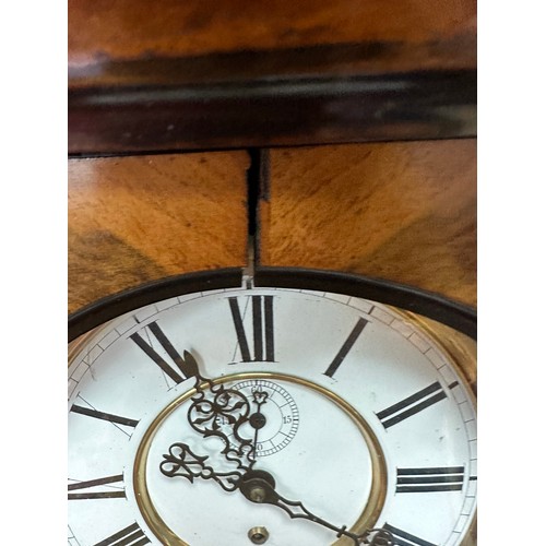 248 - An attractive wall clock. Approx 115cm tall. Wood split in some areas - see photos.