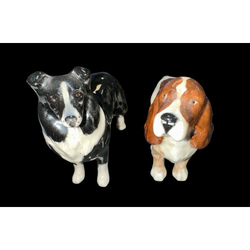 27A - Beswick, pair of Beswick  dog figures to include; a Beswick English Springer Spaniel and a Beswick B... 