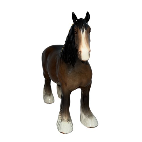 12A - Beswick, a large Beswick Shire Horse figure, model no. 818, brown gloss colour with blonde detail to... 