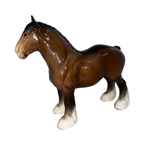 12A - Beswick, a large Beswick Shire Horse figure, model no. 818, brown gloss colour with blonde detail to... 