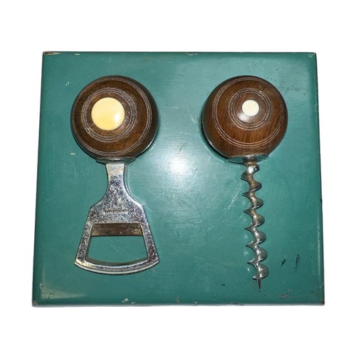 277 - Novelty vintage bowls themed bottle opener and corkscrew set, on wooden stand.