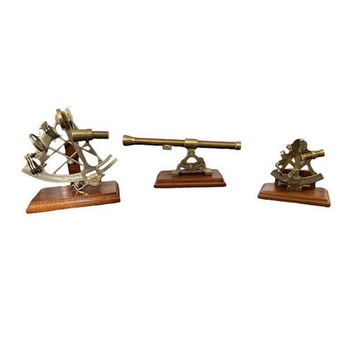 86 - Scientific Instruments 20th Century brass range with sextant (19cm tall) mounted on wooden plinth, s... 