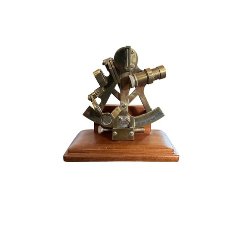 86 - Scientific Instruments 20th Century brass range with sextant (19cm tall) mounted on wooden plinth, s... 