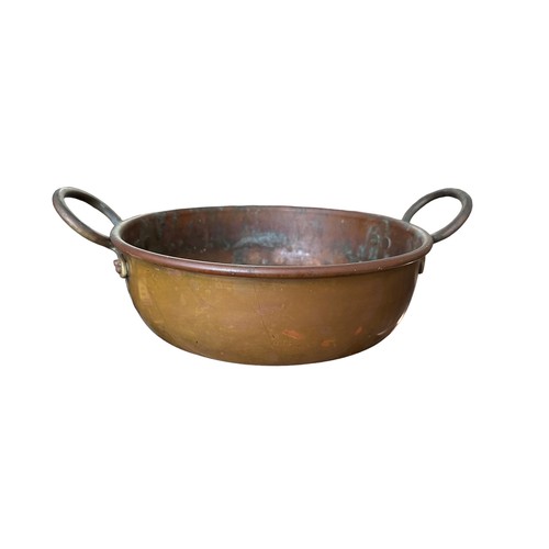 286A - Four brass/copper pans, various sizes, one with long handle.