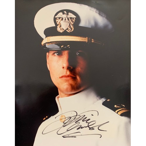 267 - Tom Cruise (b. 1962) – Top Gun, unframed signed colour photograph of Tom Cruise in white pilot unifo... 