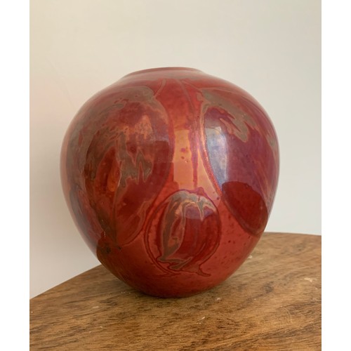 363 - A red Lustre ware hand painted vase, with hanging fruit decoration marked directly into the glaze. S... 