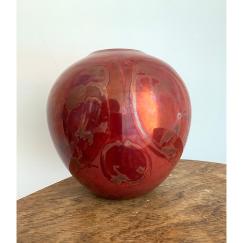 363 - A red Lustre ware hand painted vase, with hanging fruit decoration marked directly into the glaze. S... 