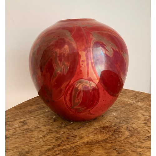 363 - A red Lustre ware hand painted vase, with hanging fruit decoration marked directly into the glaze. S... 