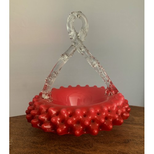 399 - Victorian cranberry glass basket, with twisted crystal handle. Height 20cm.